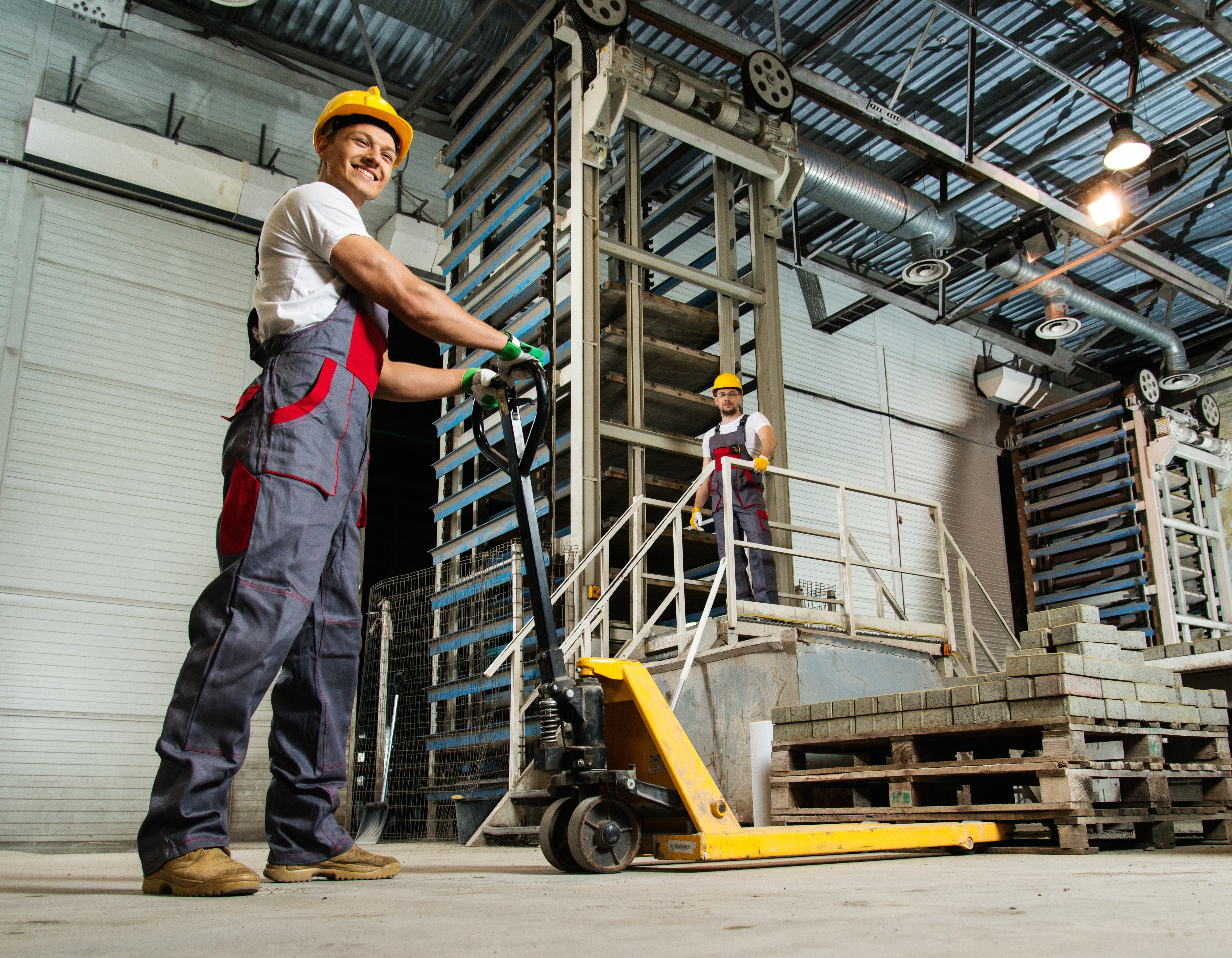 Workers on the floor of a materials plant